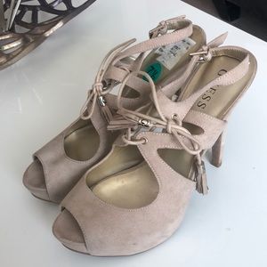 Guess tan pumps